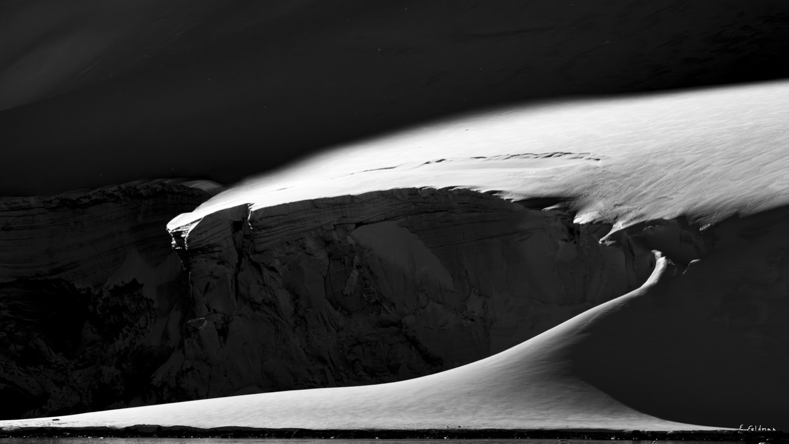 A snow ridge in black and white